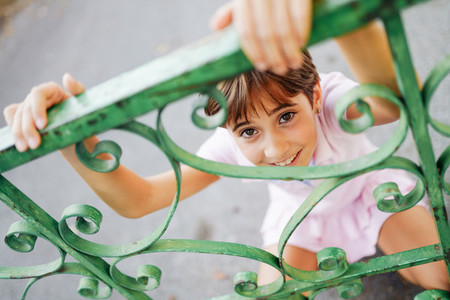 Little girl  eight years old  having fun in an urban park