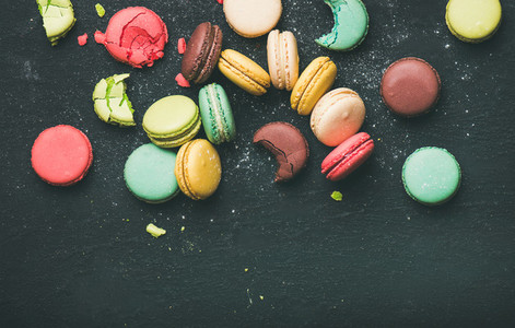 Flat lay of sweet colorful French macaron cookies