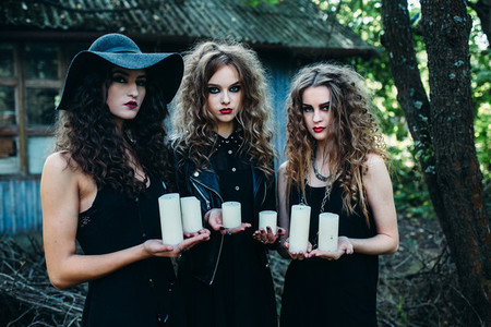 three vintage women as witches