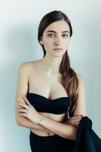 young girl in a black dress