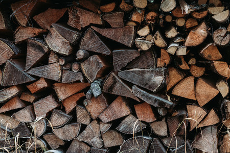 A large stack of firewood for the winter at outdoor  Rustic lifestyle background