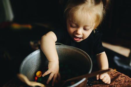 little girl playing in a witch