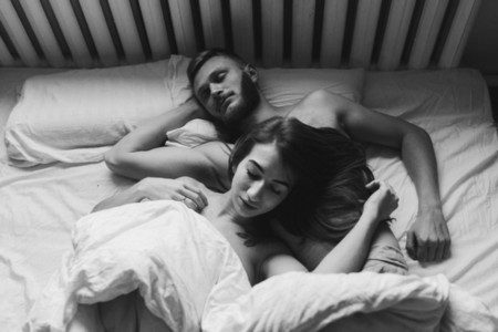 Young couple in bed together