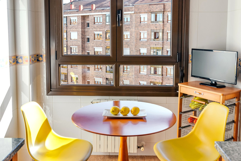 Kitchen with dining area next to the window