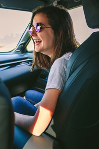 Girl laughing in the car