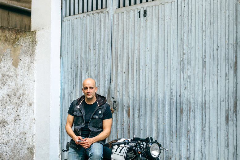 Biker posing with a motorcycle