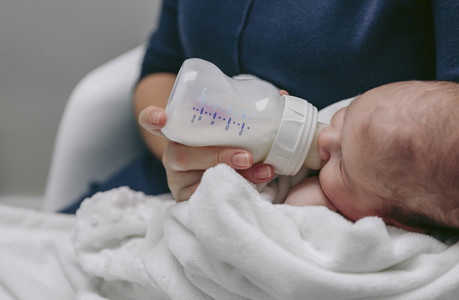 Baby detail taking feeding bottle