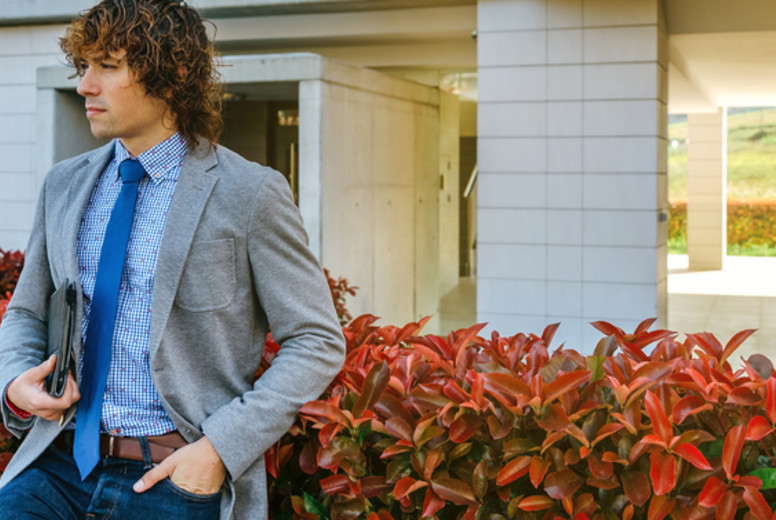 Businessman posing in the street