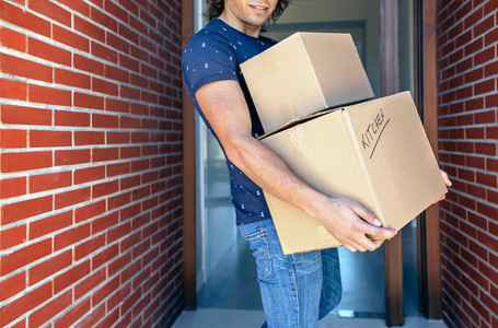 Man carrying moving boxes
