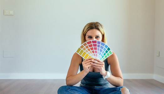 Young woman with color chart