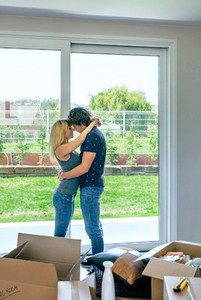 Couple hugging in the living room