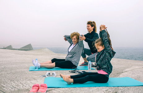 Three female generations exercising
