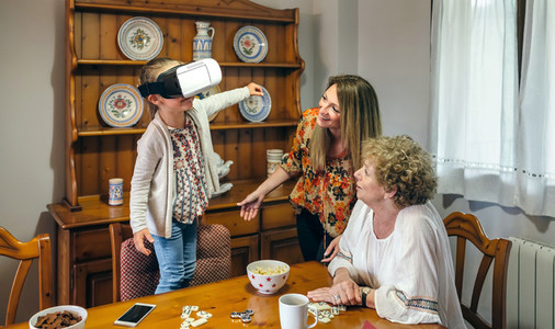 Senior woman using virtual reality glasses