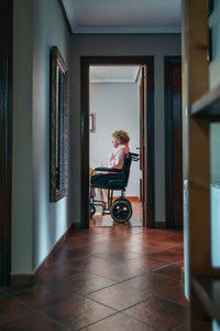 Lonely old woman in wheelchair