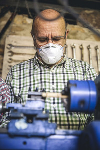 Senior man working in a carpentry