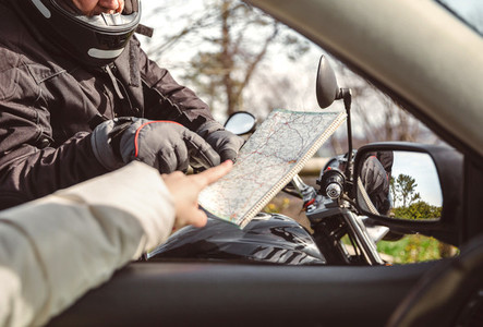 Motorcyclist asking to map direction