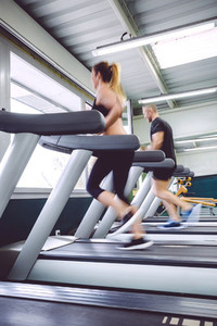 People in motion during a treadmill training