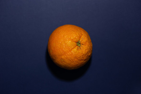 orange on a blue colored backgro