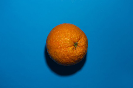 orange on a blue colored backgro
