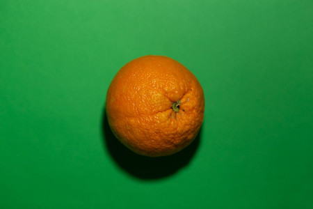 orange on a green colored backgr