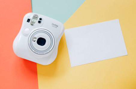 Instant camera with blank paper