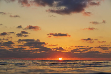 Tranquil sunset over ocean horizon