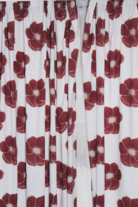 Red flowers on white curtains