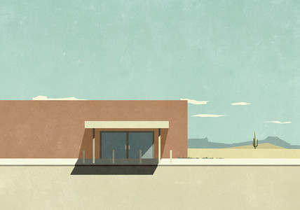 Warehouse building in sunny desert landscape