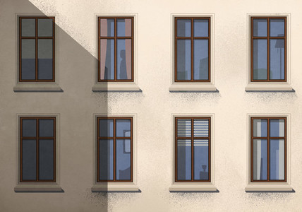 Shadow over apartment building with windows