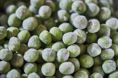 Close up frozen green peas