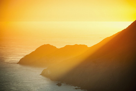 Golden sunset over ocean cliffs  San Francisco  California