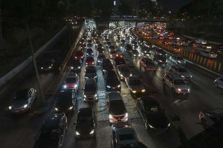 Rush hour traffic on freeway at night  Mexico