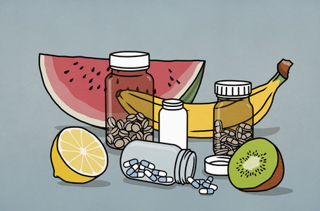 Still life fruit and supplement medication bottles