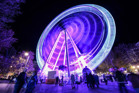 Ferris wheel at night at the fair in Granada