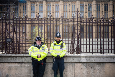 London United Kingdom April 13th 2019  Two police officers standing outside Westminster Parliament