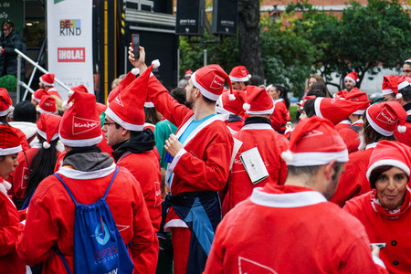 Madrid Spain December 8th 2019 Crowd of Santa Clauses running in street