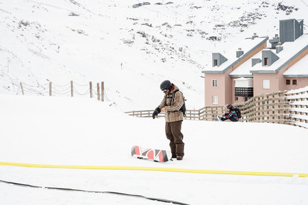 People get ready to snowboard at the Sierra Nevada ski resort