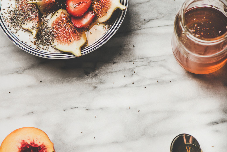 Healthy breakfast with yogurt, fruits and honey, copy space