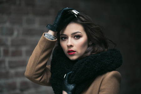 Charming fashion female modell in a coat