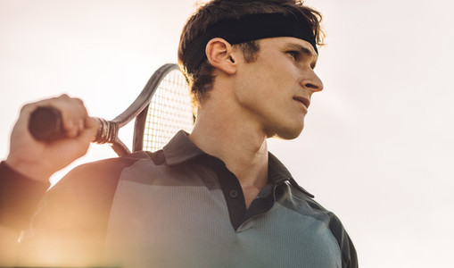 Professional tennis player looking away