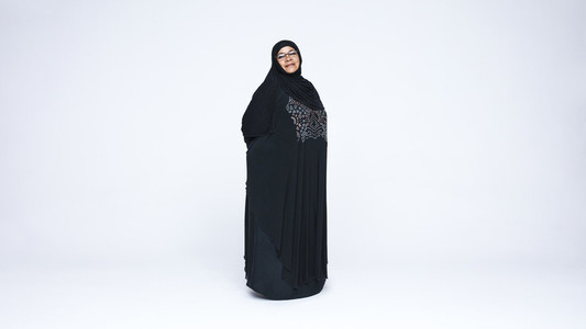 Islamic woman in hijab looking at camera