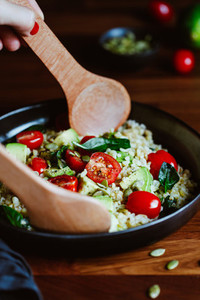 Healthy salad with bulgur  avocado  spinach and cherry tomatoes