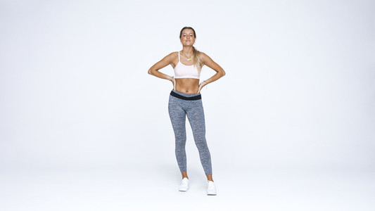 Woman athlete in workout clothes