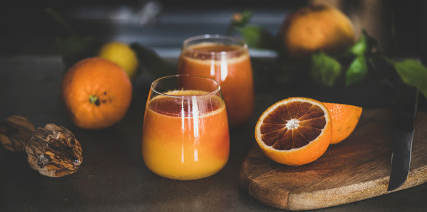 Glasses of freshly squeezed blood orange juice or smoothie  close up