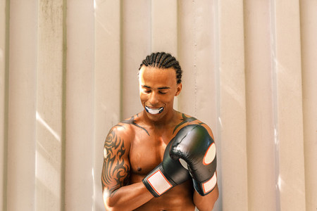 Male boxer with mouth guard