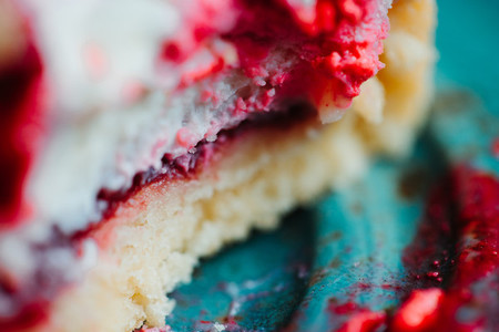 Macro view of cutted cake with cream and raspberry jam  Lifestile food photography