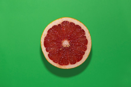 grapefruit on a green background