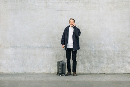 Senior man with suitcase