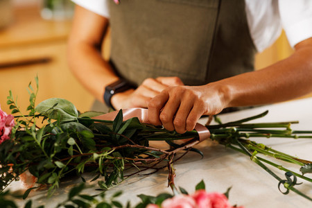 Hands of a female florist