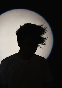 Silhouette man with textured hair